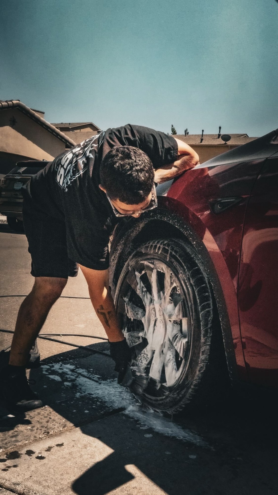 The Boss hand-detailing a wheel